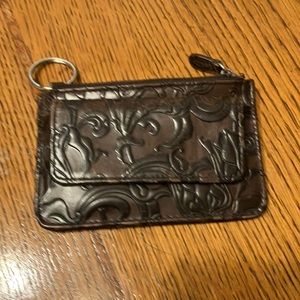 Wilson’s tooled leather zip ID good condition and credit card holder is worn